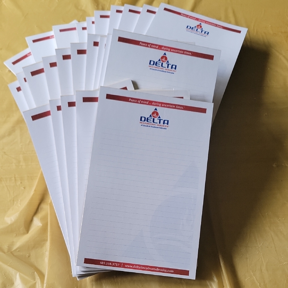 Delta Notepads with Red and Blue Accents
